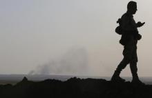 Smoke rises from a recent US air strike on Islamic State (IS) militant positions in Khazir, on the edge of Mosul, September 16, 2014. PHOTO BY REUTERS/Ahmed Jadallah