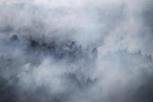 An aerial view of a forest fire burning near the village of Bokor, Meranti Islands regency, Riau province, Sumatra, Indonesia, March 15, 2016. PHOTO BY REUTERS/Rony Muharrman