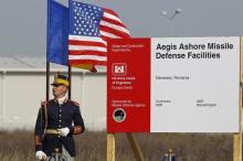 A Romanian soldier attends the official ground breaking ceremony of the site for the U.S. Aegis Ashore missile defense facility, located in a former airbase on Deveselu that will form part of a shield to protect Europe, next to Deveselu village, 182 km east of Bucharest, October 28, 2013. PHOTO BY REUTERS/Bogdan Cristel