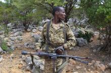 A soldier from Somalia's Puntland keeps guard on high grounds at the Galgala hills, during preparations for an offense against al Shabaab militants, January 8, 2015. PHOTO BY REUTERS/Abdiqani Hassan