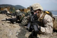 U.S. and South Korean marines participate in a U.S.-South Korea joint landing operation drill in Pohang, South Korea, in this March 31, 2014 file picture. PHOTO BY REUTERS/Kim Hong-Ji