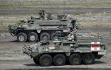U.S. soldiers aboard armoured vehicles take part during a military exercise with Philippine troops called "Balikatan" (shoulder-to-shoulder) in Capas, Tarlac in northern Philippines, April 14, 2016. PHOTO BY REUTERS/Erik De Castro