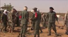 Soldiers line up the bodies of the victims after a suicide car bomb attack on a military camp in Gao, Mali January 18, 2017 in this still image taken from video. PHOTO BY REUTERS