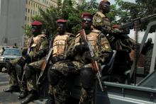 Soldiers of Ivory Coast presidential guard patrol as they arrive at the port of Abidjan, Ivory Coast, January 18, 2017. PHOTO BY REUTERS/Luc Gnago