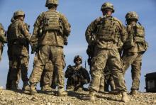 U.S. soldiers from Dragon Troop of the 3rd Cavalry Regiment discuss their mission during their first training exercise of the new year near operating base Gamberi in the Laghman province of Afghanistan, January 1, 2015. PHOTO BY REUTERS/Lucas Jackson
