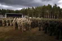 Polish and U.S. soldiers attend welcoming ceremony for U.S.-led NATO troops at polygon near Orzysz, Poland, April 13, 2017. PHOTO BY REUTERS/Kacper Pempel
