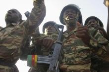 Cameroonian soldiers sing and dance during a visit by senior officers in Mabass, northern Cameroon, February 16, 2015. PHOTO BY REUTERS/Bate Felix Tabi Tabe