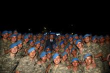 Turkish President Tayyip Erdogan poses with commandos following a fast-breaking iftar dinner at the 1. Commando Brigade in Kayseri, Turkey, June 8, 2017. PHOTO BY REUTERS/Kayhan Ozer/Presidential Palace