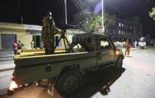 Somali government soldiers arrive at the scene of an explosion at the gate of Wehliya hotel in Somalia's capital Mogadishu, July 10, 2015. PHOTO BY REUTERS/Feisal Omar