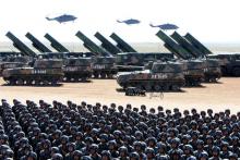 Soldiers of China's People's Liberation Army (PLA) take part in a military parade to commemorate the 90th anniversary of the foundation of the army at the Zhurihe military training base in Inner Mongolia Autonomous Region, China, July 30, 2017. PHOTO BY REUTERS/Stringer