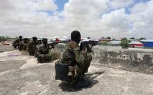 Members of Somali Armed Forces take their position during fighting between the military and police backed by intelligence forces in the Dayniile district of Mogadishu, Somalia, September 16, 2017. PHOTO BY REUTERS/Feisal Omar
