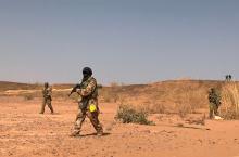 Nigerien commandos simulate a raid on a militant camp during the U.S. sponsored Flintlock exercises in Ouallam, Niger. PHOTO BY REUTERS/Aaron Ross
