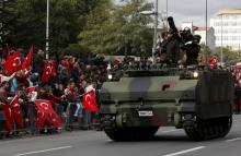 Turkish soldiers in an armored army vehicle take part in a Republic Day ceremony in Istanbul, Turkey, October 29, 2015. PHOTO BY REUTERS/Murad Sezer