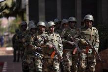 Soldiers patrol outside the Radisson hotel in Bamako, Mali, November 21, 2015 following an attack by Islamist militants. PHOTO BY REUTERS/Joe Penney