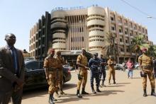 Soldiers stand guard in front of the Splendid Hotel after an attack on the hotel and a restaurant in Ouagadougou, Burkina Faso, January 18, 2016. PHOTO BY REUTERS/Joe Penney