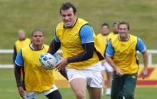 South African Springbok rugby players Juan de Jongh (L) and Bismark du Plessis (C) train during a practice session in Taupo