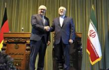 Iran's Foreign Minister Mohammad Javad Zarif (R) shakes hand with his German counterpart Frank-Walter Steinmeier after a joint news conference in Tehran, October 17, 2015. PHOTO BY REUTERS/Sabine Siebold