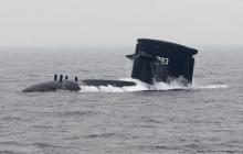 Taiwan navy's SS-793 Hai Lung diesel-electric submarine emerges from underwater during a naval demonstration near a military navy base in Kaohsiung, southern Taiwan, in this January 22, 2013 file photo. PHOTO BY REUTERS/Pichi Chuang