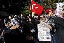 Supporters of Gulen movement shout slogans during a protest outside the Kanalturk and Bugun TV building in Istanbul, Turkey, October 28, 2015. PHOTO BY REUTERS/Murad Sezer
