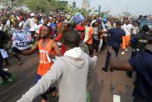 Supporters of Congolese opposition leader Jean-Pierre Bemba chant slogans outside the N'djili International Airport as he arrives in Kinshasa, Democratic Republic of Congo, August 1, 2018. PHOTO BY REUTERS/Kenny Katombe