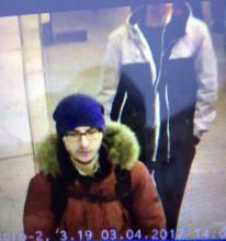 A still image of suspect Akbarzhon Jalilov walking at St Petersburg's metro station. PHOTO BY REUTERS/5th Channel Russia