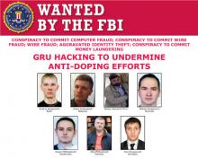 A U.S. Federal Bureau of Investigation (FBI) poster shows photographs of seven men identified as Russian intelligence officers who were indicted in Washington, D.C., October 4, 2018. PHOTO BY REUTERS/Federal Bureau of Investigation