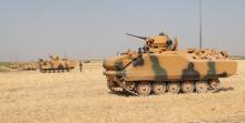 Turkish soldiers on armoured personnel carriers (APC) are seen during a military exercise near the Turkish-Iraqi border in Silopi, Turkey, September 18, 2017. PHOTO BY REUTERS/Mehmet Selim Yalcin/Dogan News Agency, DHA