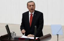 Turkey's President Tayyip Erdogan addresses the Turkish Parliament during a debate marking the reconvene of the parliament in Ankara