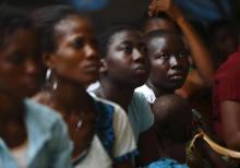 Youths attend a talk on sexual and domestic violence and HIV/AIDS prevention organised by the local chamber of professional workers and the Centre Esperance Loyola (CEL - Loyola Hope Centre), a West African Jesuit organisation, in Agoe-Nyive, a suburb of Lome, April 15, 2013. PHOTO BY REUTERS/Darrin Zammit Lupi