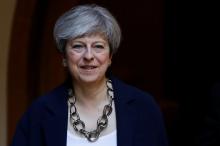 Britain's Prime Minister Theresa May leaves after a church service in Sonning, Britain, June 11, 2017. PHOTO BY REUTERS/Stefan Wermuth