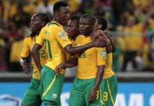 South Africa's striker Tokelo Rantie (R) celebrates his goal against Mali with his teammates during their African Cup of Nations (AFCON 2013) quarter-final soccer match at the Moses Mabhida stadium in Durban, February 2, 2013. PHOTO BY REUTERS/Rogan Ward