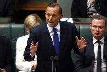 Australia's Prime Minister Tony Abbott speaks in the Australian Parliament located in the Australian capital city of Canberra, February 23, 2015. PHOTO BY REUTERS/David Gray
