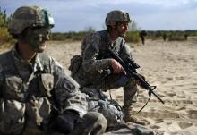 Troops from the U.S. Army's 173rd Infantry Brigade Combat Team participate at the NATO-led exercise "Orzel Alert" held together with Canada's 3rd Battalion and Princess Patricia's Light Infantry, and Poland's 6th Airborne Brigade in Bledowska Desert in Chechlo, near Olkusz, south Poland, May 5, 2014. PHOTO BY REUTERS/Kacper Pempel