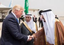 Saudi Arabia's King Salman bin Abdulaziz Al Saud shakes hands with U.S. President Donald Trump during a reception ceremony in Riyadh, Saudi Arabia, May 20, 2017. PHOTO BY REUTERS/Bandar Algaloud/Courtesy of Saudi Royal Court