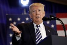 U.S. President Donald Trump delivers remarks before signing an executive order on strengthening retirement security in America at Harris Conference Center in Charlotte, NC, U.S., August 31, 2018. PHOTO BY REUTERS/Yuri Gripas