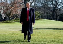 U.S. President Donald Trump walks before speaking to the media as he returns from Camp David to the White House in Washington, U.S., January 6, 2019. PHOTO BY REUTERS/Joshua Roberts