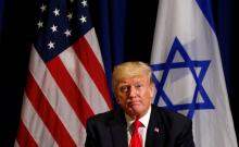 U.S. President Donald Trump listens during his meeting with Israeli Prime Minister Benjamin Netanyahu in New York, U.S., September 18, 2017. PHOTO BY REUTERS/Kevin Lamarque