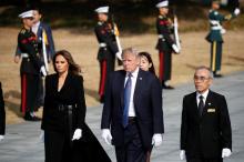 U.S. President Donald Trump and first lady Melania Trump arrive at the National Cemetery in Seoul, South Korea, November 8, 2017. PHOTO BY REUTERS/Kim Hong-Ji