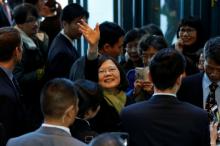 Taiwan President Tsai Ing-wen waves to supporters as she leaves a hotel for her return to Taiwan after her visit to Latin America in Burlingame, California, U.S., January 14, 2017. PHOTO BY REUTERS/Stephen Lam