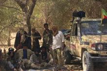 Fighters from the Tuareg separatist rebel group MNLA take shade under a tree in the desert near Tabankort, February 13, 2015. PHOTO BY REUTERS/Souleymane Ag Anara