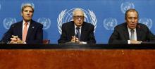 U.S. Secretary of State John Kerry (L) sits with U.N. Special Representative Lakhdar Brahimi (C) and Russian Foreign Minister Sergei Lavrov as they each make a statement to the press