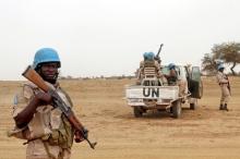 UN peacekeepers stand guard in the northern town of Kouroume, Mali, May 13, 2015. PHOTO BY REUTERS/Adama Diarra