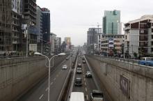 Cars drive out of an underpass in Addis Ababa