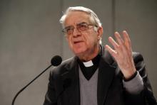 Vatican spokesman Father Federico Lombardi talks to reporters during a news conference at the Vatican