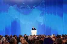 Russian President Vladimir Putin addresses the Federal Assembly, including the State Duma parliamentarians, members of the Federation Council, regional governors and other high-ranking officials, in Moscow, Russia, March 1, 2018. PHOTO BY REUTERS/Maxim Shemetov