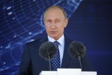 Russian President Vladimir Putin delivers a speech during an opening ceremony of the MAKS International Aviation and Space Salon in Zhukovsky, outside Moscow, Russia, August 25, 2015. PHOTO BY REUTERS/Maxim Shemetov