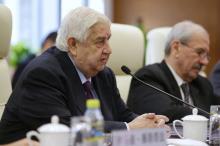 Syrian Foreign Minister Walid al-Moualem speaks during a meeting with China's Foreign Minister Wang Yi in Beijing, China, December 24, 2015. PHOTO BY REUTERS/Jason Lee