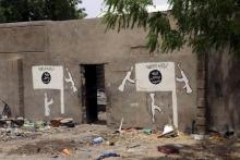 A wall painted by Boko Haram is pictured in Damasak, March 24, 2015. PHOTO BY REUTERS/Joe Penney