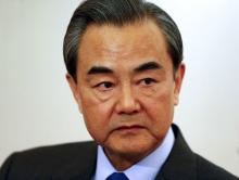 China's Foreign Minister Wang Yi answers reporter's questions during a Reuters interview in Munich, Germany, February 12, 2016. PHOTO BY REUTERS/Michael Dalder