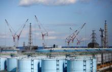 The reactor units No.1 to 4 are seen over storage tanks for radioactive water at Tokyo Electric Power Co's (TEPCO) tsunami-crippled Fukushima Daiichi nuclear power plant in Okuma town, Fukushima prefecture, Japan, February 18, 2019. PHOTO BY REUTERS/Issei Kato